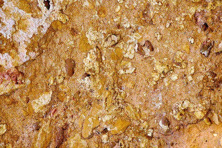 Brown grungy wall Sandstone surface background. Abstract texture of old wallの写真素材