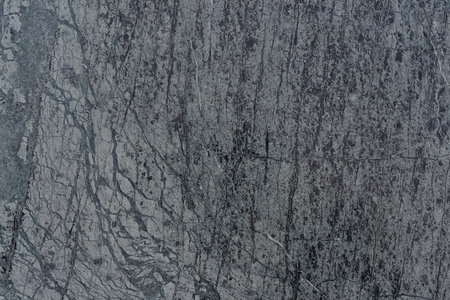 Grunge background or texture. Dark grey rustic wall.の写真素材
