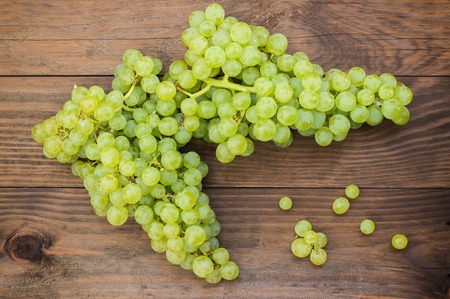 Sultan Grapes on a wooden background. Close-up.の写真素材