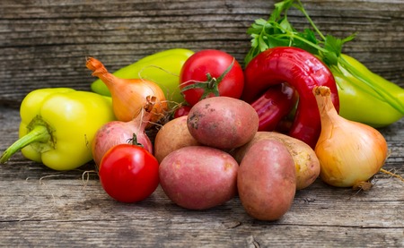 Vegetable set on a wooden background. Close-upの写真素材