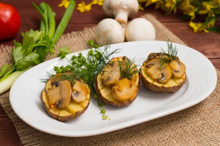Baked potatoes with fried mushrooms. Top viewの写真素材