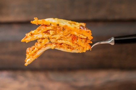 Lasagna, traditional Italian food on a wooden background. Close-upの写真素材