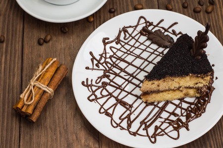 Truffle cake with coffee for breakfast. wood backgroundの写真素材