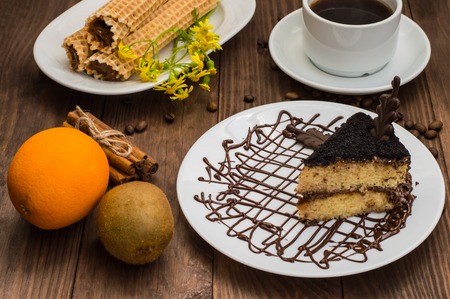 Truffle cake with coffee for breakfast. wood background