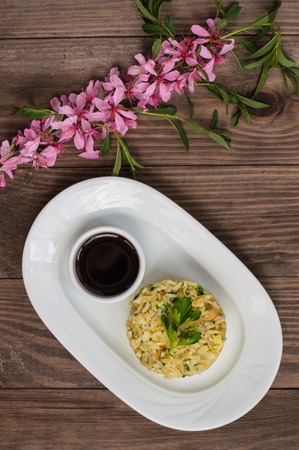 Fried rice with egg and greens. Chinese cuisine. Wooden background. Top view. Close-upの写真素材