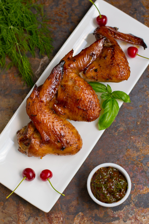 Marinated chicken wings in Japanese. On an Old table. Top viewの写真素材