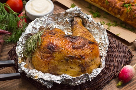 Grilled chicken ham marinated in balsamic sauce, spicy Italian herbs and fresh lemon. Restaurant supply on a wooden table. Close-upの写真素材