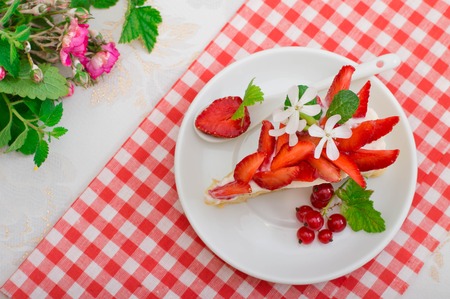 Napoleon cake with strawberries. Wihte background. Top view. Close-upの写真素材