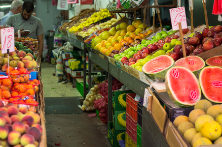 The fresh flavored colorful juicy fruits in the stall of Carmel market, Tel Aviv, Israel.のeditorial素材