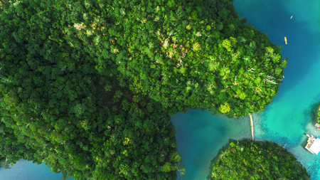 Aerial view of Sugba lagoon. Beautiful landscape with blue sea lagoon, National Park, Siargao...