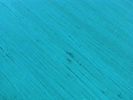 Aerial view of a turquoise blue shallow sea and a visibly streaked sandy bottom outside of San Pedro Belize in the Caribbean.の写真素材