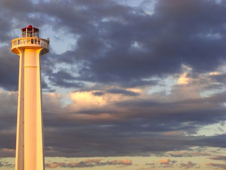 Lighthouse and afternoon sky in Mahahual Mexicoの写真素材