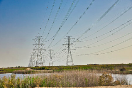High Power Electric transmission grid lines in the desert.Dammam -Saudi Arabia.の写真素材