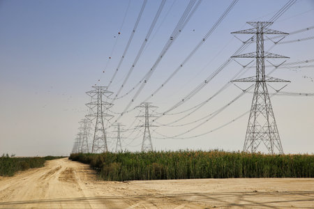 High Power Electric transmission grid lines in the desert.Dammam -Saudi Arabia.の写真素材