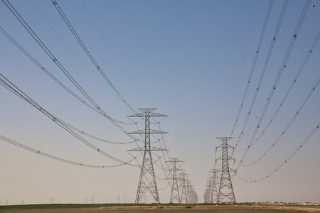 High Power Electric transmission grid lines in the desert.Dammam -Saudi Arabia.の写真素材