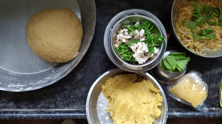 The process of making homemade dumplings with minced puran vegetables and herbs. Puran poliの写真素材
