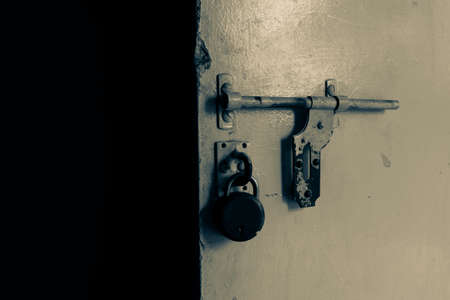 a close view of half opened door in officeの写真素材