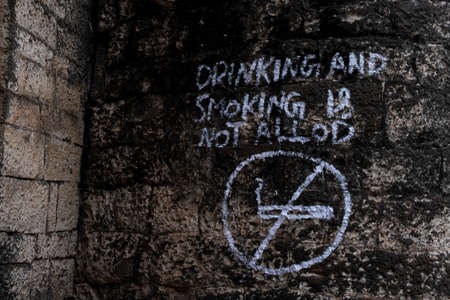 a close shot of Indian hand written slogan isolated in fort wall, Kalaburagi, Karnataka/India-October, 30.2020のeditorial素材