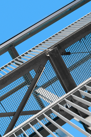 Modern steel structure view from below; External building fire escape in modern