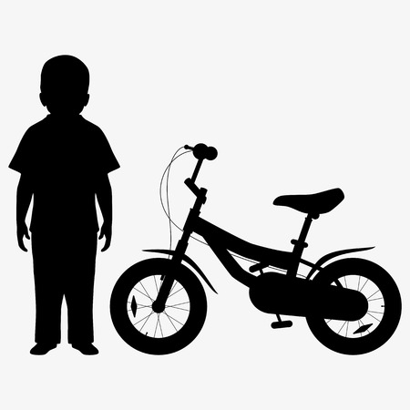 Kid and bicycle silhouetteの写真素材