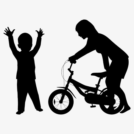 Mom giving son a bicycle silhouetteの写真素材