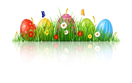 Easter background with eggs in grassの写真素材