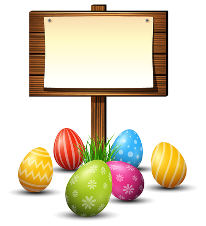 Easter eggs with wooden boardの写真素材