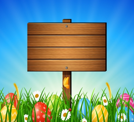 Easter background with colorful eggs and blank signの写真素材