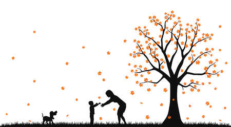 Mother and child in the autumn parkの写真素材