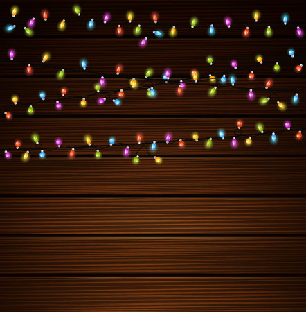 Christmas lights on wooden backgroundのイラスト素材