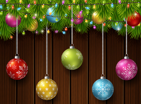 Christmas background with fir tree branches, color balls, and light bulbsのイラスト素材