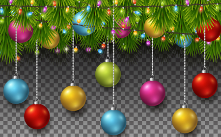 Christmas background with fir tree branches, color balls, and light bulbsの写真素材