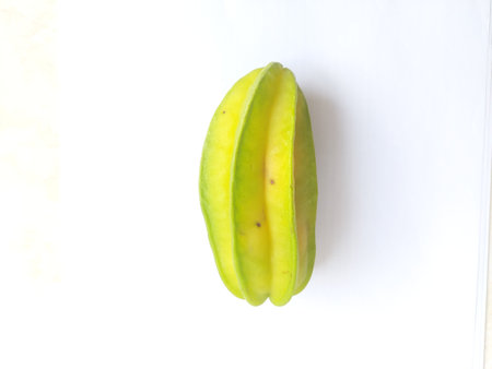 Fresh young star fruit on a white backgroundの写真素材