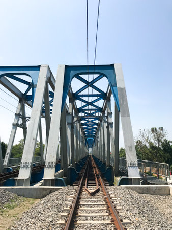 Surakarta, Indonesia. Agustus 27, 2022. The railway bridge that crosses the Bengawan Solo riverのeditorial素材