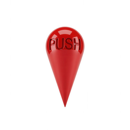 A glossy red location pin shaped button with the word PUSH embossed on its surface, isolated on a white background.の素材