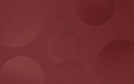 Minimal deep red monochrome abstract, subtle soft circle background texture for modern digital designの写真素材