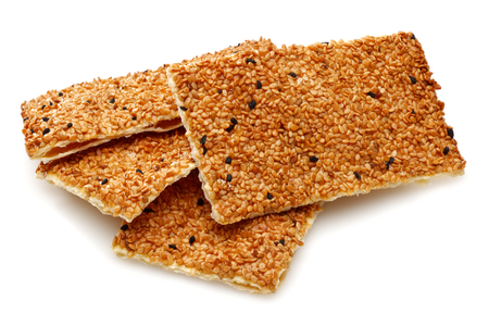 Sesame crackers isolated on white backgroundの写真素材