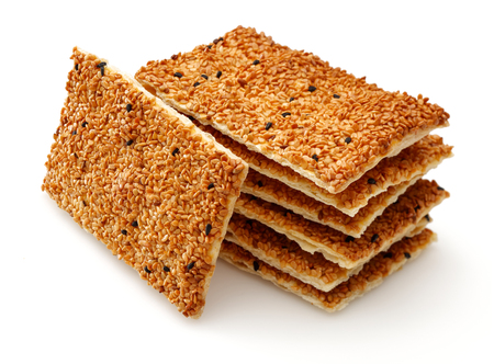 Sesame crackers isolated on white backgroundの写真素材
