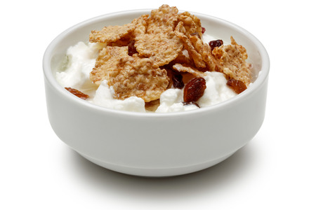 Cereal and yoghurt in bowl isolated on white background