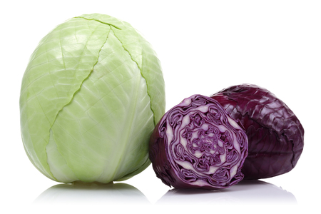 Fresh green and red cabbage with slice isolated on white backgroundの写真素材