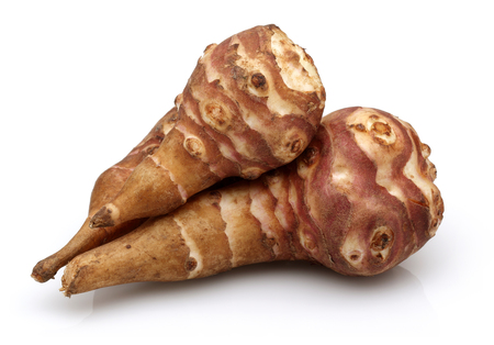 Jerusalem artichoke or sweet potato isolated on white backgroundの写真素材