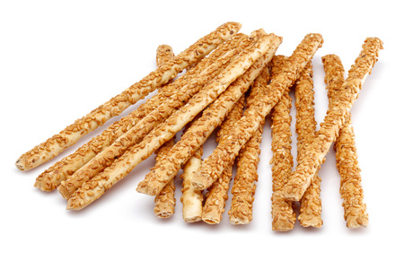 Sesame stick crackers isolated on white backgroundの写真素材