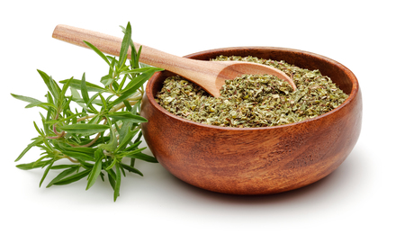 Fresh thyme and dried thyme in wooden bowl isolated on white backgroundの写真素材