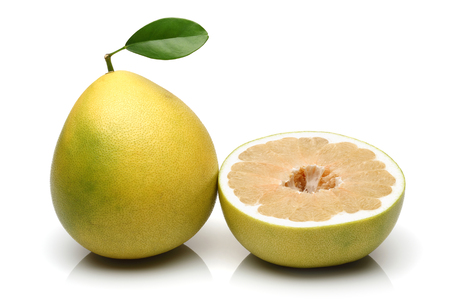 Fresh pomelo fruits isolated on white backgroundの写真素材