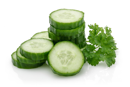 Fresh cucumber slices isolated on white backgroundの写真素材