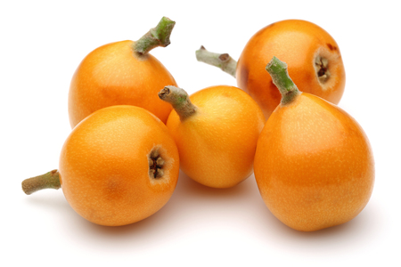 Ripe loquat fruits isolated on white backgroundの写真素材