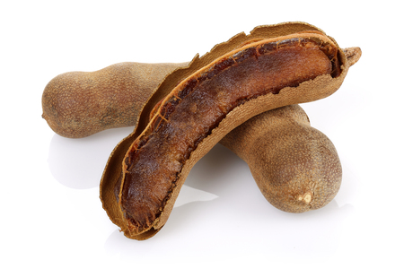Fresh tamarind fruit isolated on white backgroundの写真素材