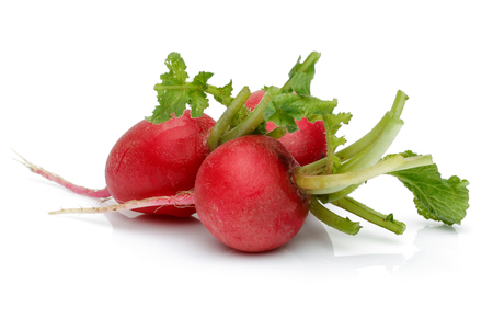 Red radish and green leaves isolated on white backgroundの写真素材