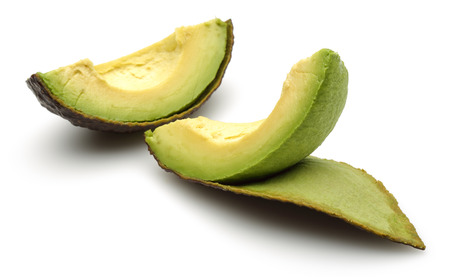 Ripe avocado slices isolated on white background