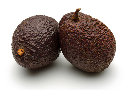 Fresh  ripe avocados isolated on white background